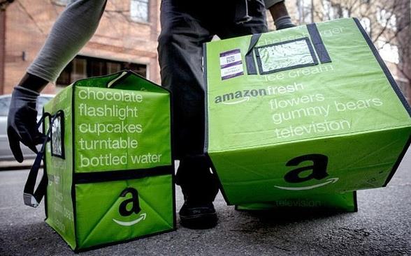 亚马逊和沃尔玛抢饭碗推实体便利店，自动读取车牌提货