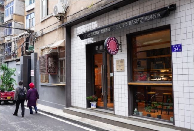 因听障人士而存在，德国店长爱心接力长沙无声面包店